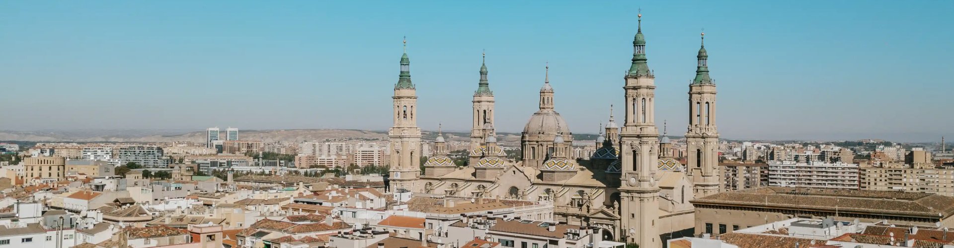 Zaragoza cityscape at sunset